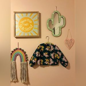 This is a 2T Girls Floral Jacket.